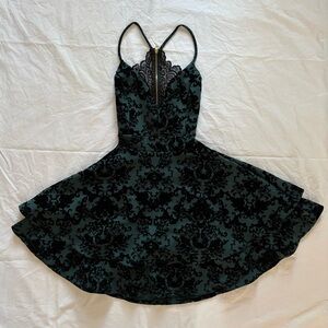 Green and black velvet dress with open back and black lace zipper back